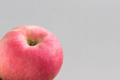 Close-up of apple against white background
