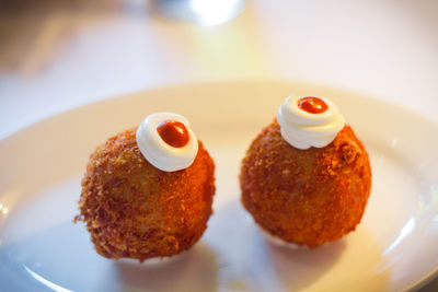 Close-up of dessert served on table