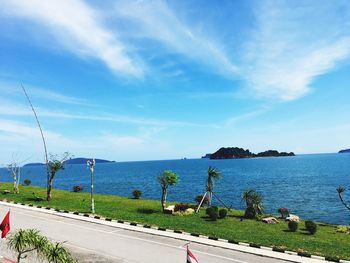 Scenic view of sea against blue sky