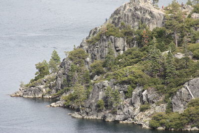 Scenic view of sea by cliff