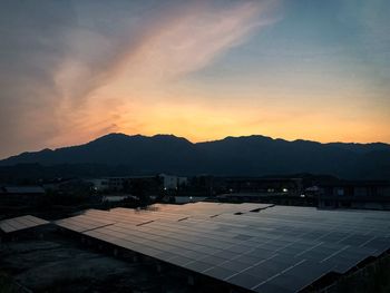 Scenic view of mountains against sky during sunset