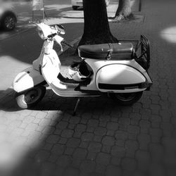 Close-up of motorcycle on street at night