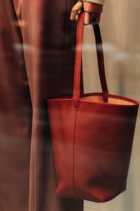 Details of a brown stylish leather bag. casual women's fashion cloth and accessories