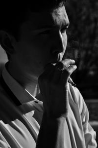 Man smoking cigarette outdoors