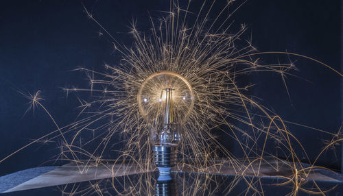 Firework display at night