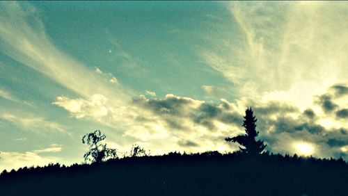 Scenic view of landscape against sky at sunset