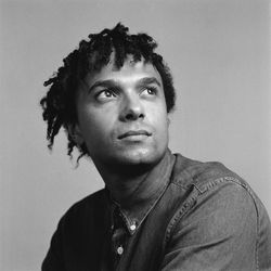 Portrait of young man against white background