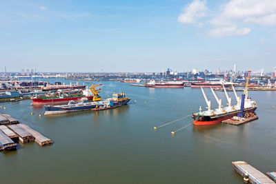 Boats moored at harbor