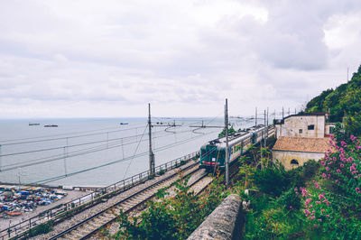 High angle view of bridge over sea against sky