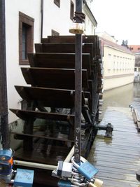 Padlocks on metal by water wheel