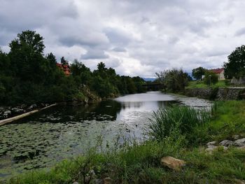 Scenic view of river against sky