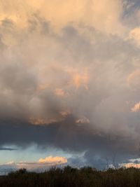 Scenic view of field against sky during sunset