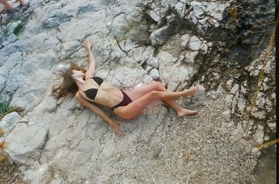 Low section of woman in water