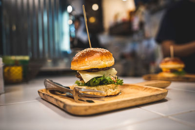 Close-up of burger on table in restaurant