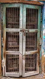 Closed window of old abandoned building