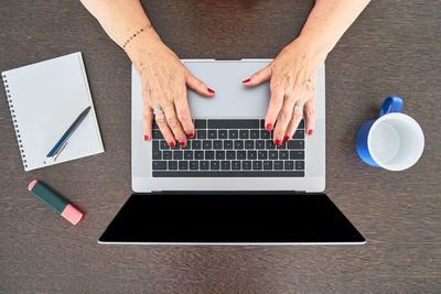 High angle view of laptop on table