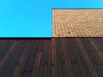 Roof against clear blue sky