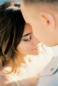 Close-up of young woman looking away