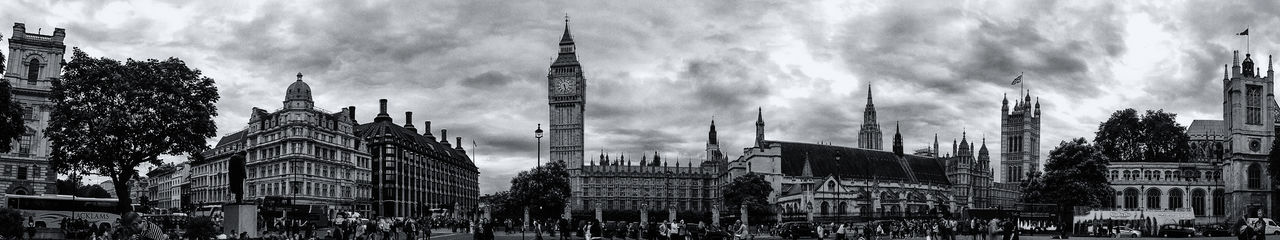 Panoramic view of big ben with cityscape against sky