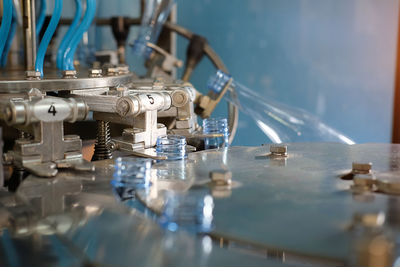 Close-up of machinery on table at factory