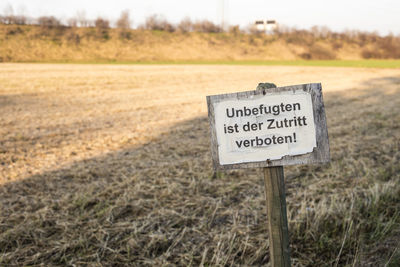 Warning sign on field