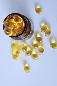 High angle view of bottles in glass