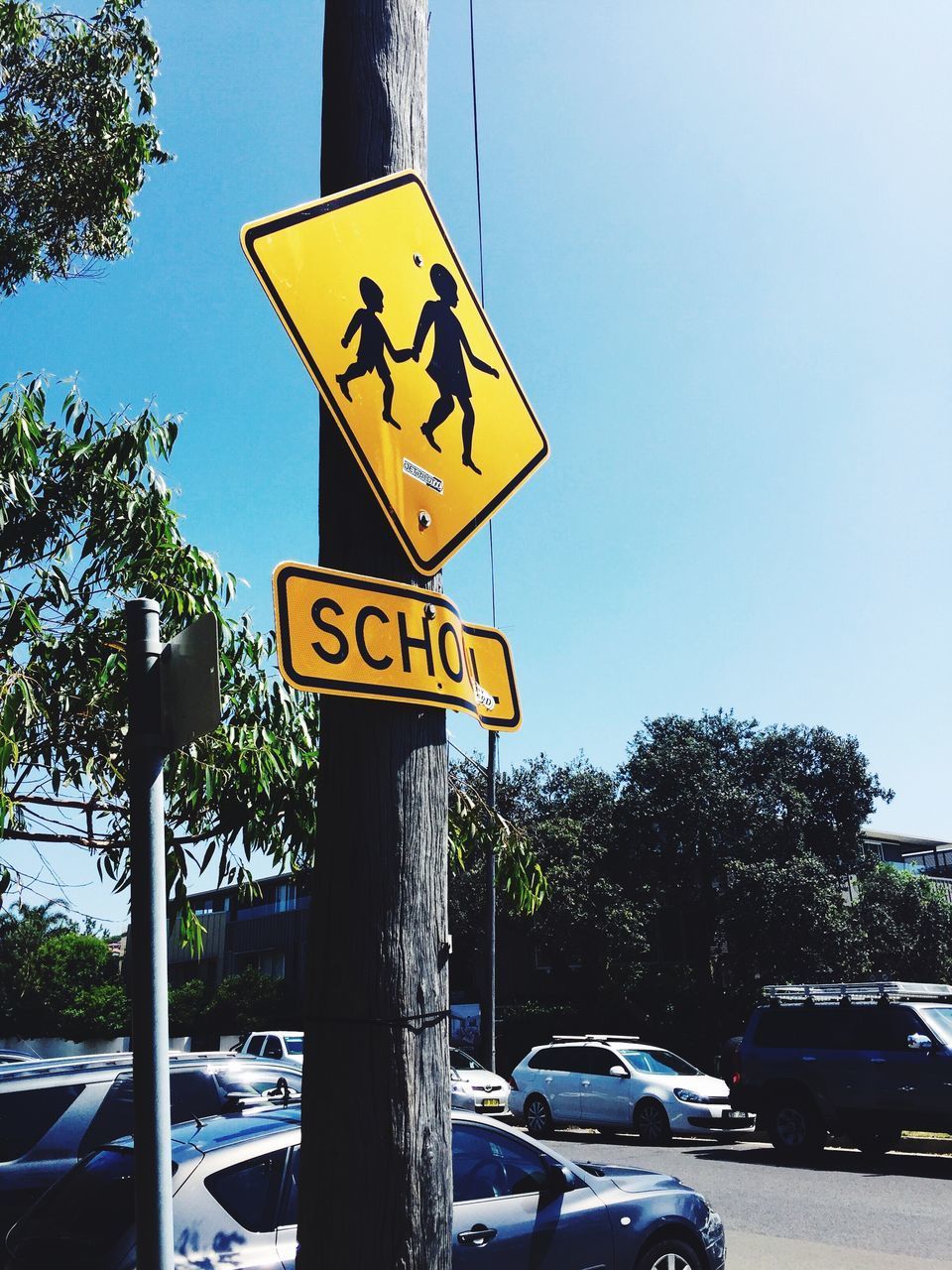 ROAD SIGN AGAINST SKY