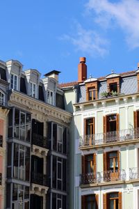 Low angle view of buildings against sky