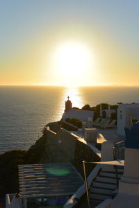 Scenic view of sea against clear sky during sunset