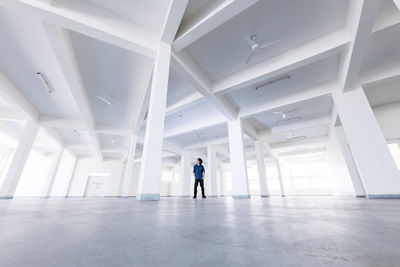 Man standing in empty building