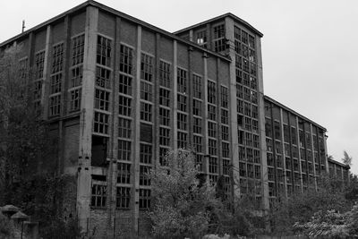 Low angle view of old building against sky