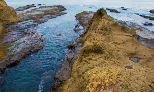 High angle view of rocks on shore