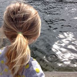 Girl standing in water