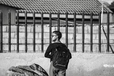 Man standing by building