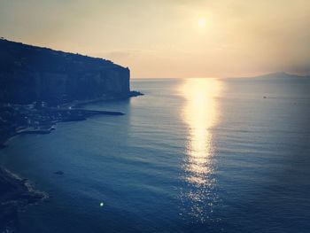 Scenic view of sea at sunset