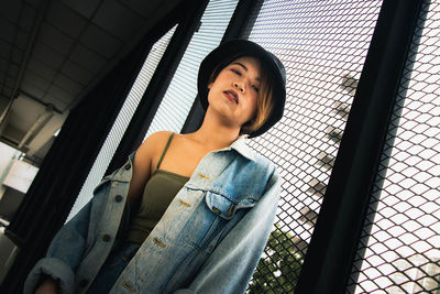 Portrait of young woman looking away