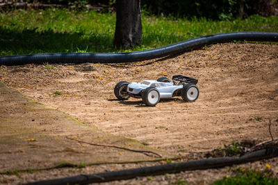 Close-up of vintage car on field