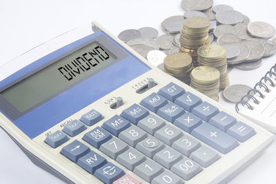 High angle view of coins on table