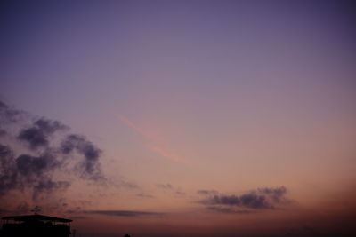 Low angle view of dramatic sky during sunset