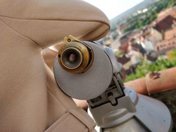 Close-up of person photographing camera on land