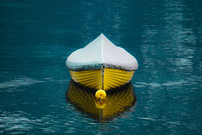 Yellow floating on water in lake, locarno switzerland
