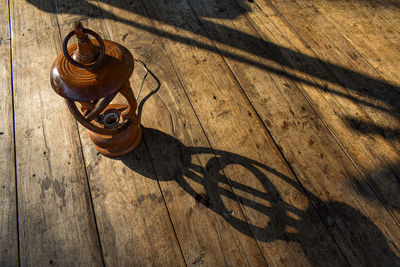 High angle view of beer on wooden table