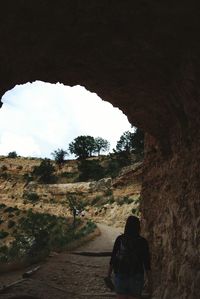 People walking in tunnel