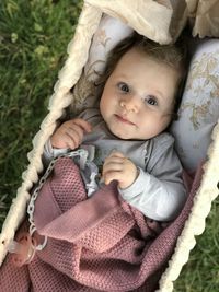 High angle portrait of cute baby lying down