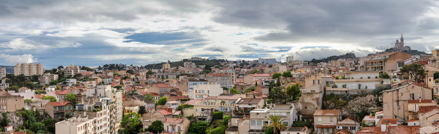 Aerial view of townscape against sky