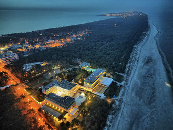 High angle view of illuminated cityscape at night