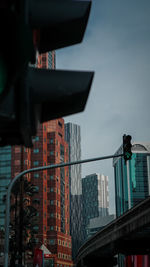 Exterior of modern buildings in city against sky