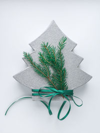 High angle view of christmas tree against white background