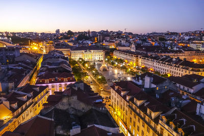 High angle view of city buildings at night