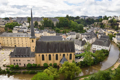 Église saint-jean-du-grund church, alzette river, and cityscape panorama of old town, luxembourg 